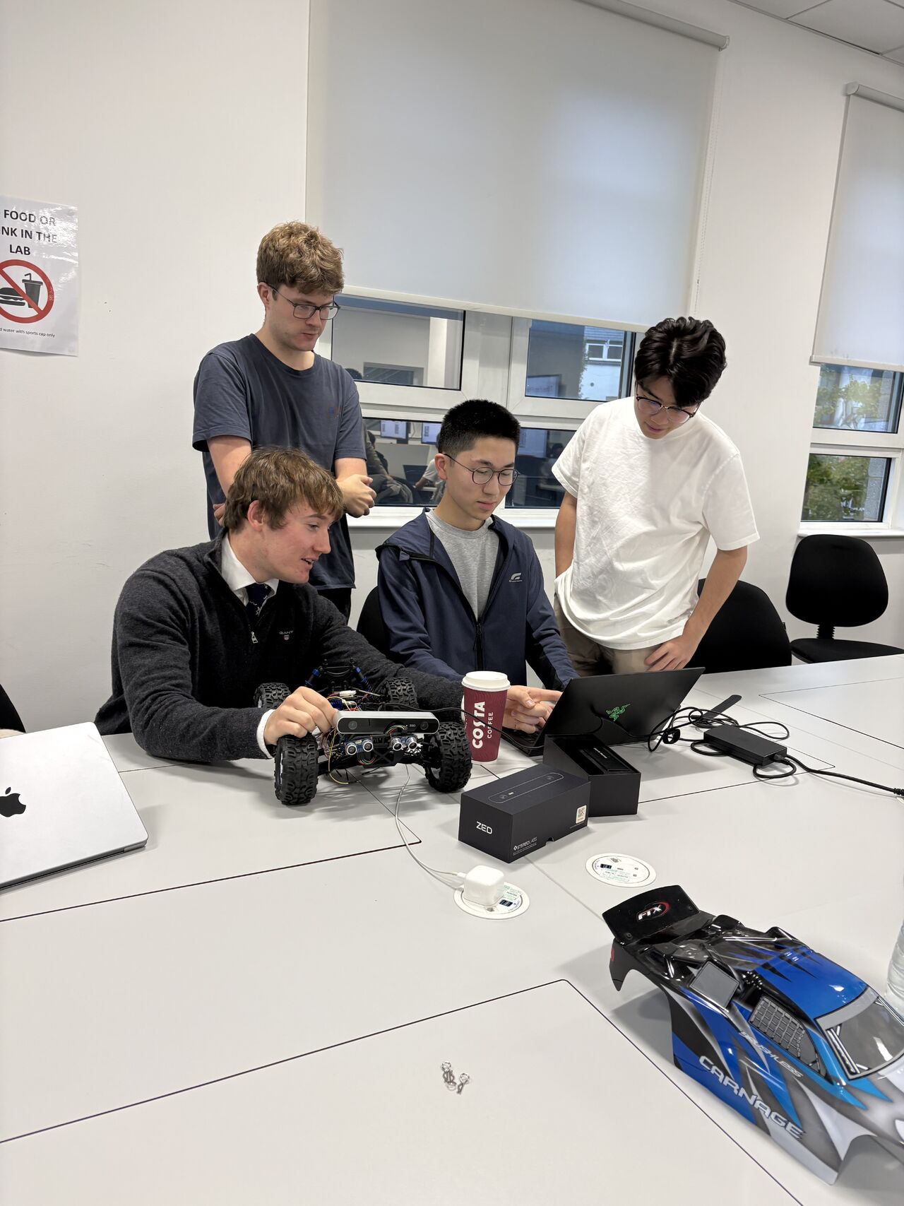 Tom Lam and teammates testing an autonomous vehicle prototype